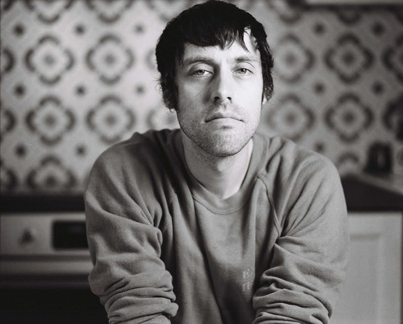 Portrait photo of Fredrik Floen in black and white
